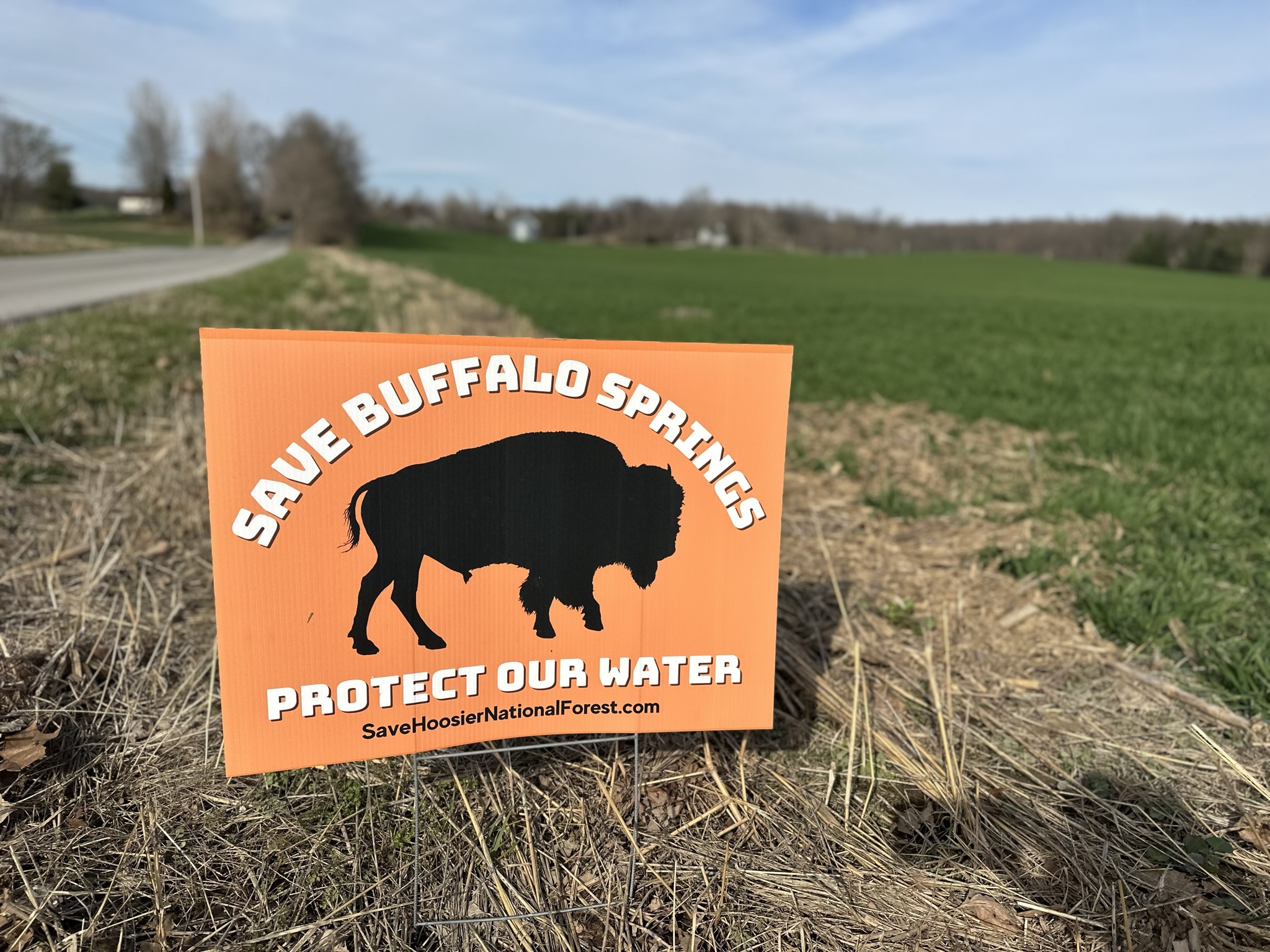 Save Buffalo Springs — Protect Our Water sign along the farm road